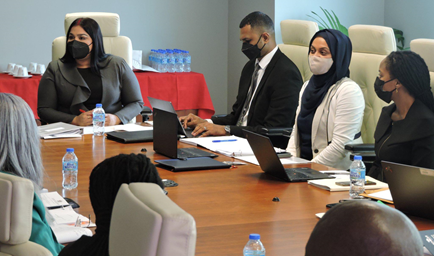 Members of the Criminal Justice Unit with Senator the Honourable Renuka Sagramsingh-Sooklal at a meeting with the Commissioner of Police and others on the abolition of preliminary enquiries in Trinidad and Tobago