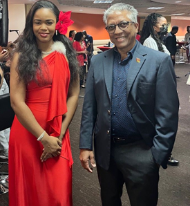 The Honourable Attorney General with a member of the Criminal Justice Unit, Ms. Sasha Ann Moses, National Ex Tempo Champion who performed at AGLA’s Christmas Concert