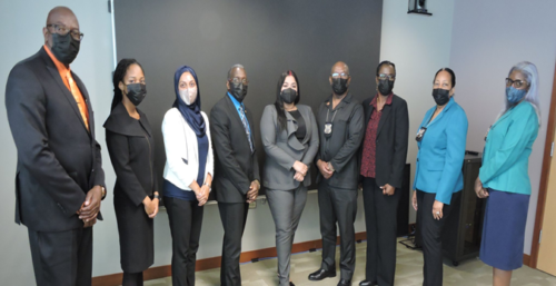 Members of the Criminal Justice Unit with Senator the Honourable Renuka Sagramsingh-Sooklal and members of the Trinidad and Tobago Police Service (TTPS)